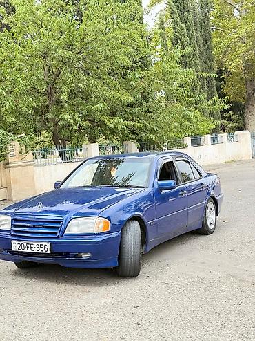 car parking maşın satışı: Mercedes-Benz C-Sinif sedan (W202) — mavi rəng, 4 qapı. Xüsusiyyətlər — 3