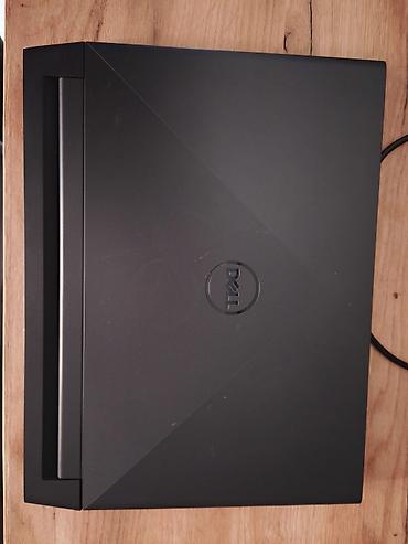 Ноутбуки Dell: Игровой ноутбук Dell серии G15 в строгом черном корпусе. Подходит для — 4