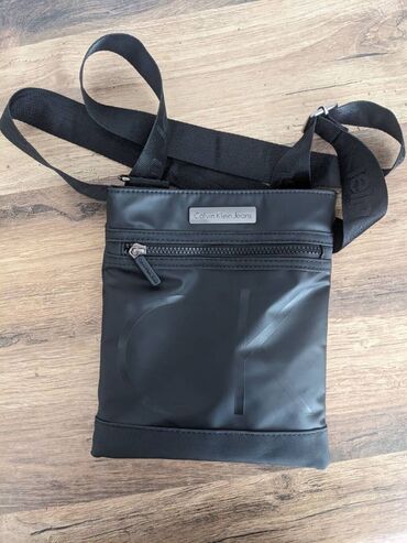 сумка для ноутбуков: Барсетка "Calvin Klein" Размер : 24х21 см Брал пару месяцев назад (