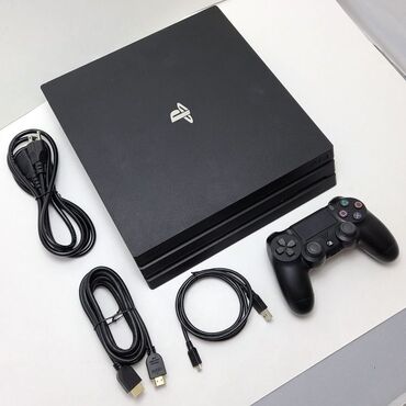 sony playstation 4 pro цена в бишкеке: Игровая консоль Sony PlayStation 4 черного цвета, способная