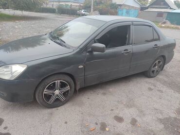 бу хово: Mitsubishi Lancer: 2003 г., 1.6 л, Механика, Бензин, Седан