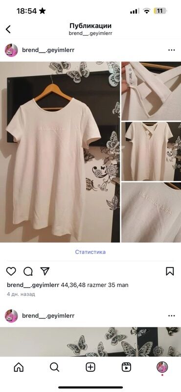 ağ futbolka: Ağ rəngdə, qısaqol, düz biçimli t-shirt. Üzərində "NOTHING TO SAY"