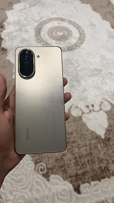 Redmi: Redmi A5, 128 GB, rəng - Qızılı, Barmaq izi, İki sim kartlı — 1
