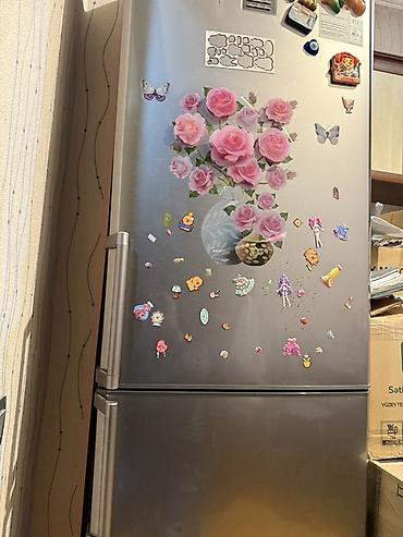 iki kamerali soyuducu: Soyuducu, ikiqapılı, aşağıda dondurucu bölməsi ilə. - Rəng — 5