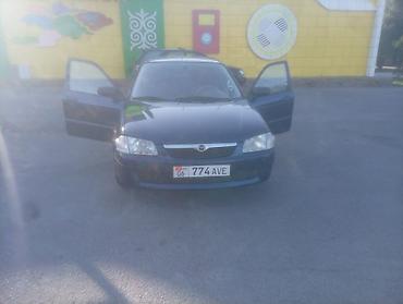 222 кузов: Mazda Familia: 2000 г., 1.5 л, Механика, Бензин, Седан — 7
