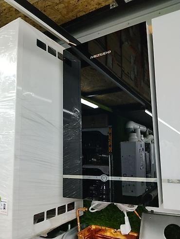 Настенный газовый котёл Mizudo - Современный дизайн с чёрной at lalafo.kg Настенный газовый котёл Mizudo - Современный дизайн с чёрной