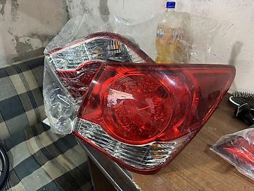 toyota corolla stop: Chevrolet Cruze öncəsi/sonrası). Şəkillərdə həm baqaj qapağı — 4