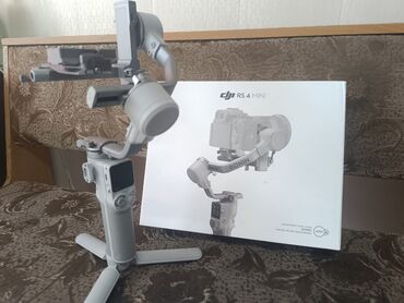 свой ноутбук: Электронный стабилизатор для камеры DJI RS 4 Mini обеспечивает плавную