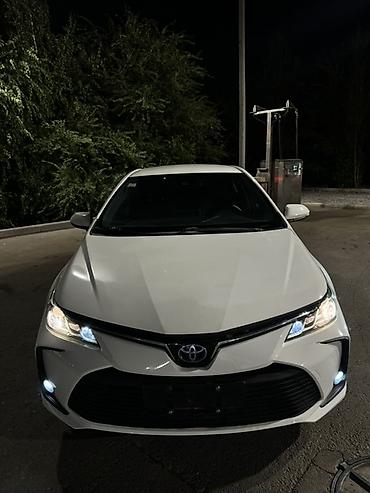 byd e1: Toyota Corolla: 2022 г., 1.8 л, Автомат, Гибрид, Седан — 2