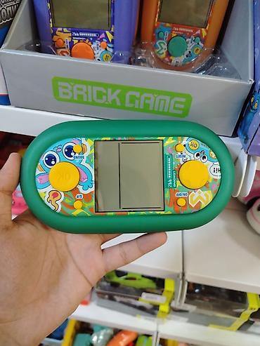 детские игры: Портативная игровая приставка Brick Game - Карманная электронная игра — 1