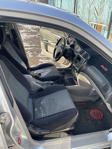 Mazda: Mazda 323: 2003 г., 1.6 л, Бензин, Универсал — 13