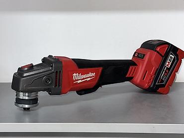 Электроинструменты: Аккумуляторный многофункциональный инструмент Milwaukee M18 — 1