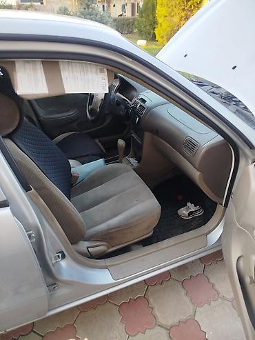 Toyota Corolla: 2001 г., 1.8 л, Автомат, Газ, Седан