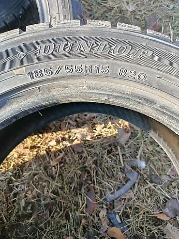 выкуп нексияа: Комплект автомобильных шин Dunlop размером 185/55 R15 82Q. Зимние — 1