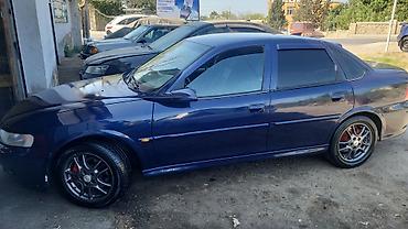 Opel: Opel Vectra B sedan - Kuzov: 4 qapılı sedan, tünd göy rəng - Mühərrik — 2