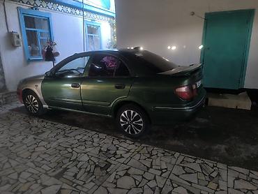 sl 55: Nissan Almera: 2000 г., Механика, Седан — 8
