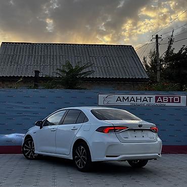 шевроле еквінокс: Toyota Corolla: 2022 г., 1.8 л, Автомат, Гибрид, Седан — 4