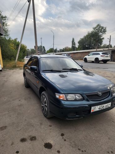 домкрать: Mazda 626: 1999 г., Бензин, Седан
