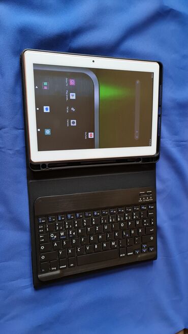Tableti: Tablet sa maskom,blutut tastaturom, ima za 2 sim kartice, nov — 14