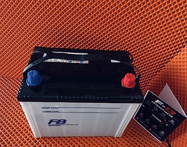 справа: Аккумулятор FB (The Furukawa Battery Co., Ltd.) — Made in Japan - — 3