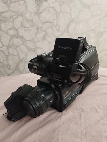 Видеокамеры: Видеокамера Sony DCR-SD1000 - Плечевая видеокамера с матрицей Exmor R — 3