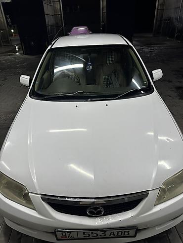 Mazda Familia: 2002 г., 1.5 л, Автомат, Бензин