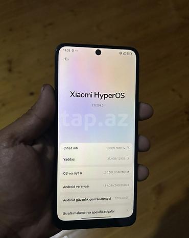 a 3 telefon: Xiaomi 128 GB, rəng - Qara, 
 İki sim kartlı — 1