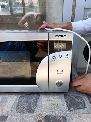 Мясорубки: Микроволновка Beko, Отдельностоящая, С микроволнами, цвет - Серый