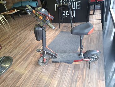 купить трюковой самокат в бишкеке: KUGOO M4 elektrik skuter - Güclü çərçivə və iri təkərlər: qabaqda cüt