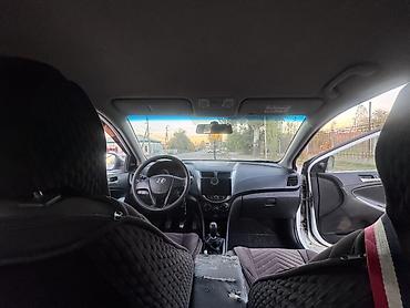 mazda 3 2004: Hyundai Solaris: 2015 г., 1.4 л, Механика, Бензин, Седан — 8