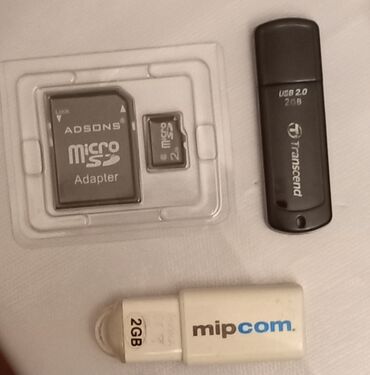 capture card: 2 ədəd 2 gbliq fleşkart; bir ədəd kart üçün adapter ve 2 gbliq sd