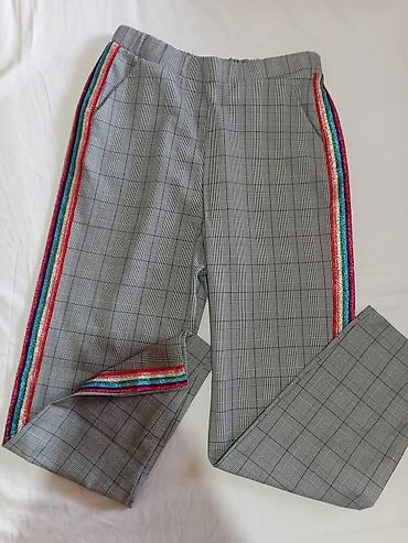 helanke sa uzengijama: Ženske pantalone sa kariranim dezenom i šljokičastim prugama - Model — 1