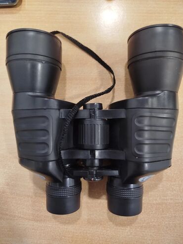 Binokllar: Binokl – klassik Porro prizmalı, geniş obyektivli model. Mədədə — 1