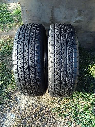 Шины 235 / 65 / R 17, Зима, Б/у, Пара, Внедорожные (АТ/МТ), Китай, Bridgestone