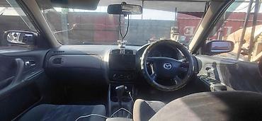мазла: Mazda Familia: 1999 г., Бензин, Универсал — 6