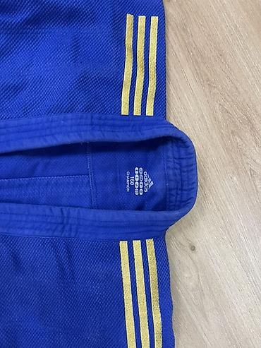 пояса дзюдо: Синее кимоно для дзюдо Adidas Champion + штаны Вверх лицензионный - — 4