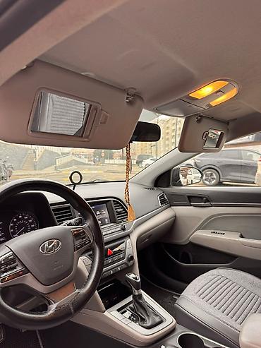 böyük güzgü: Hyundai Elantra salonu və daxili avadanlıqları - Avtomatik sürətlər — 3