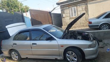 крыло рекс: Mitsubishi Lancer: 1997 г., 1.3 л, Механика, Бензин, Седан
