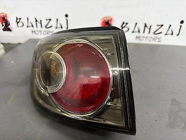 демио авариний: Задний левый стоп-сигнал Mazda 2005 г., Б/у, Оригинал, Япония — 2