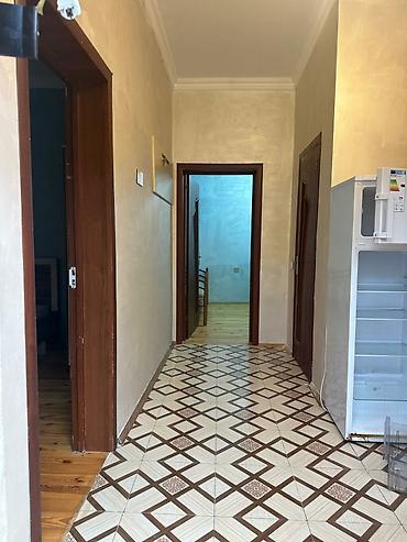 Həyət evləri və villaların satışı: Aileye verilir Merdekan 8 dalanda her serayiti var isti pol kombi — 2