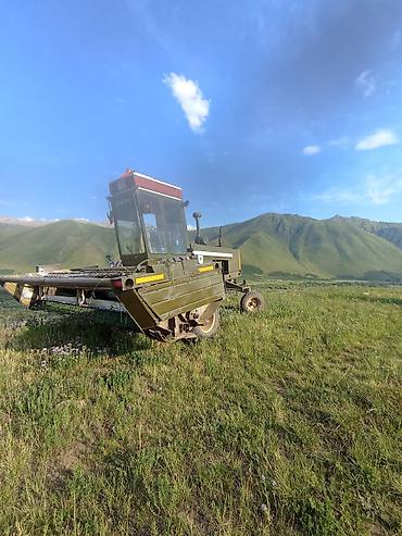 Кормоуборочные комбайны: Ешка 303 жатка - Широкозахватная жатка с фронтальным расположением — 10