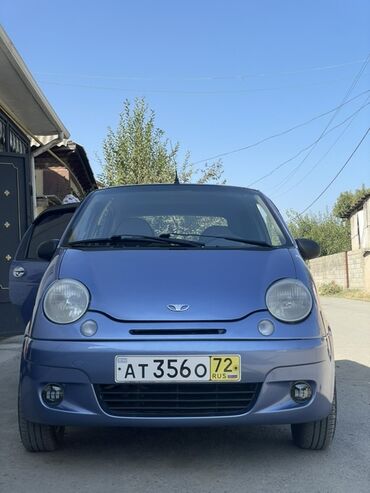 срочно продаю в связи с переездом: Хэтчбек Daewoo Matiz синего цвета. Автомобиль оснащен механической