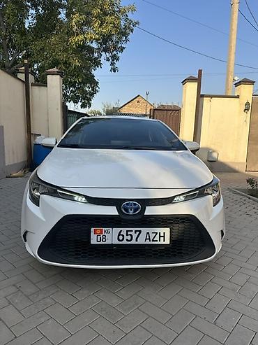 королла 2015: Toyota Corolla: 2023 г., 1.8 л, Автомат, Гибрид, Седан — 2
