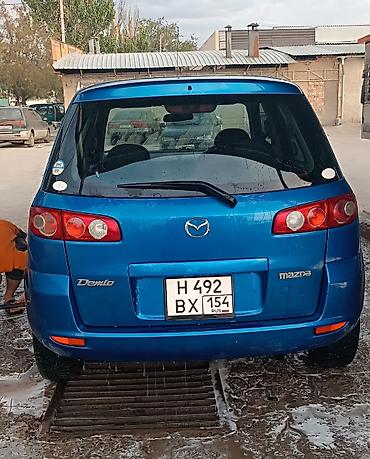 митсубиси спейс стар: Mazda Demio: 2003 г., Автомат, Бензин, Хэтчбэк — 6