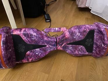 Elektrik hoverboard – qalaktika temalı bənövşəyi dizayn 1 ildir