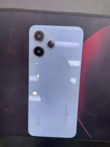 сколько стоит аккумулятор для телефона: Смартфон Xiaomi Redmi 12 светло-голубого цвета с тройной камерой и