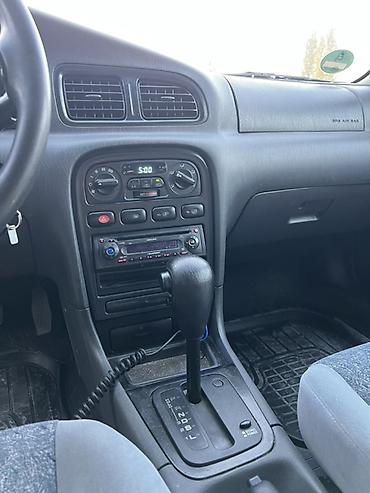 айнек рамка: Kia Clarus: 2000 г., 2 л, Автомат, Бензин, Универсал — 7