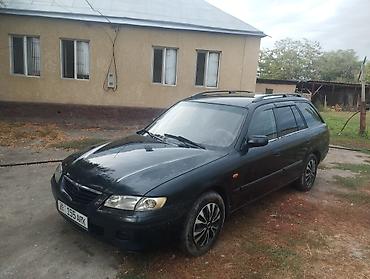 степ аэробика: Mazda Capella: 2000 г., 1.8 л, Механика, Бензин, Универсал — 1