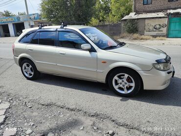 фара 323: Mazda 323: 2003 г., 1.6 л, Механика, Бензин, Хэтчбэк