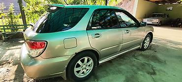 мото зонтик: Subaru Impreza: 2005 г., 1.5 л, Автомат, Бензин, Универсал — 2